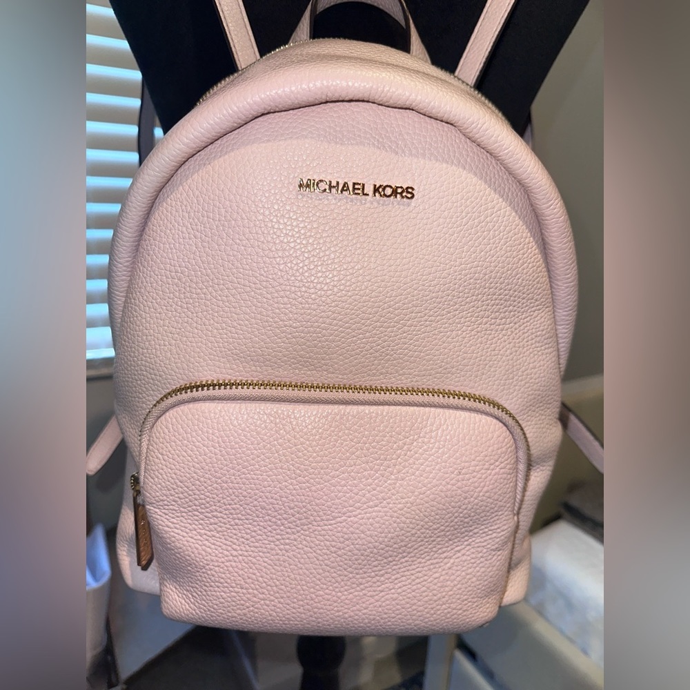 Light pink Micheal Kors backpack purse